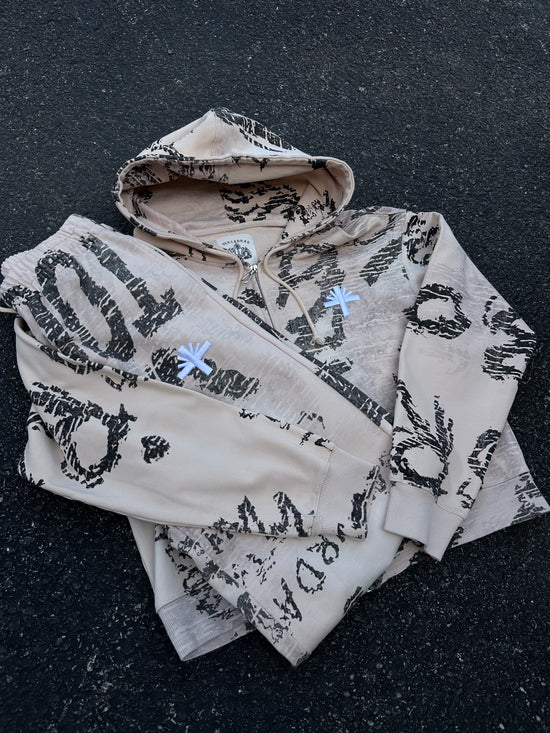 VERTABRAE IVORY GRAFFITI SWEATSUIT